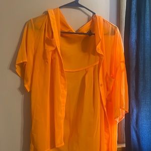 a see through orange blouse.